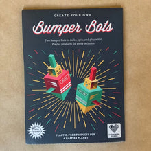 Load image into Gallery viewer, Two itsy-bitsy Bumper Bots to make, spin and play with! Just pop out the pieces and fold together for a fun game of battling robots! Perfect for a party bag or stocking filler, this simple and eco-friendly kit is made from one piece of recycled card. Plastic-free for a happier planet, and no glue or scissors needed