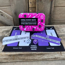 Load image into Gallery viewer, A fun quiz game where the roll of the dice dictates the questions. In this tiny tin there are over 600 questions on the best music and performers across all the genres. From rock to pop, jazz to blues, even opera to disco!