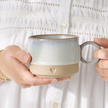 Load image into Gallery viewer, Mug with heart motif - light blue edge
